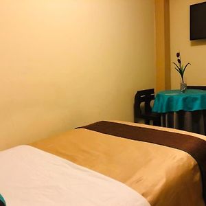 Habitación Estándar con Cama Queen